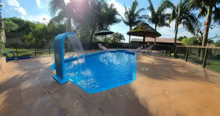 Casa de 03 dormitórios e com piscina no Bairro Stella Maris em Alvorada.
