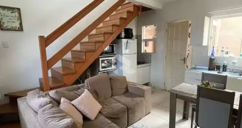 Casa Geminada de dois dormitórios no Bairro  Tarumã