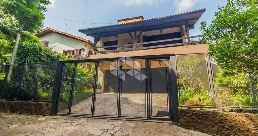 Casa 7 dorms à venda Rua Edgar Luiz Schneider, Jardim Isabel - Porto Alegre