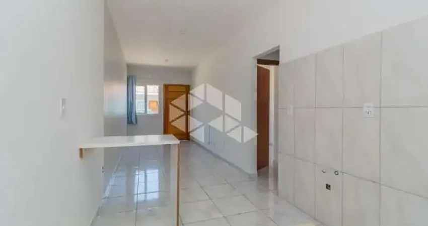 Casa em condomínio fechado a venda no bairro Ponta Grossa em Porto Alegre.