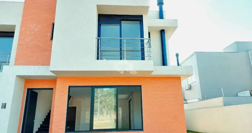 Casa em condomínio fechado com 3 quartos à venda na Rua Sete Mil Cento e Oitenta e Dois, 11, Hípica, Porto Alegre