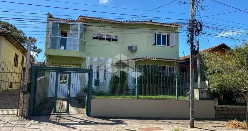 Casa com 3 quartos à venda na Rua Ibirubá, 94, Cavalhada, Porto Alegre