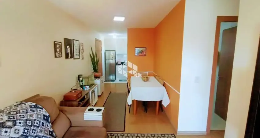 Apartamento semimobiliado com 2 quartos uma vaga de garagem coberta e com 52m, de frente para o por do sol no bairro charqueadas.