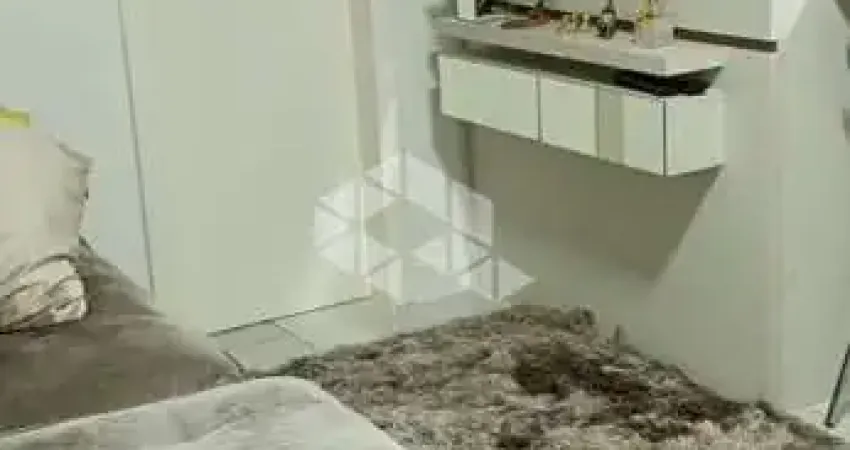 Casa para venda no bairro Desvio Rizzo 2 dormitórios com 1 vaga de garagem