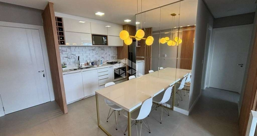 Apartamento com 2 dormitório mobiliado e 1 vaga de garagem em Torres.