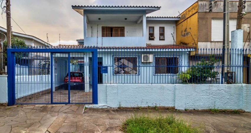 Casa com 3 quartos à venda na Rua Coronel Jaime da Costa Pereira, 318, Partenon, Porto Alegre