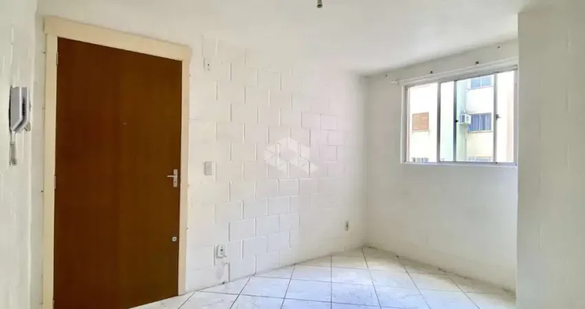 Apartamento a venda com 2 dormitórios, sala cozinha, banheiro , área de serviço e vaga de estacionamento rotativa