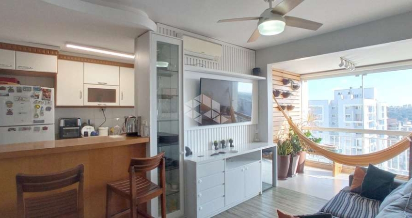 Apartamento residencial com 2 dormitórios, e 2 vagas escrituradas à venda no bairro Passo da Areia em Porto Alegre com 70 m²