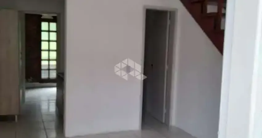 Casa tipo sobrado, com 2 dormitórios - 1 vaga de garagem na frente da casa - Vila Nova