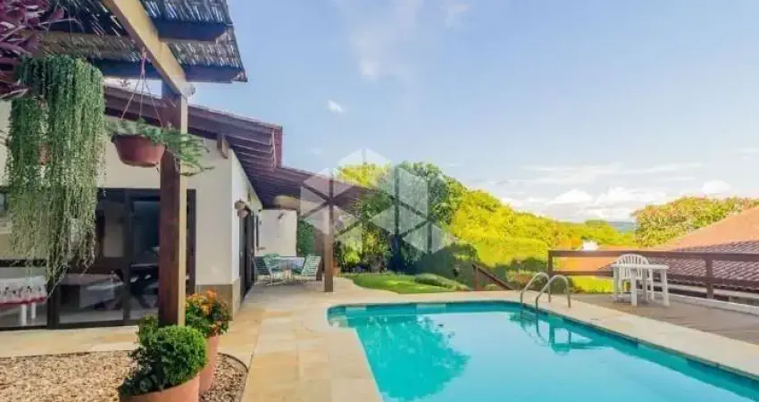 Casa com 4 quartos à venda na Rua Chiriguano, 290, Vila Assunção, Porto Alegre