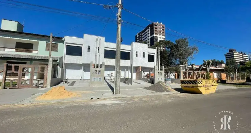 Duplex duas suítes novo no centro de Tramandaí