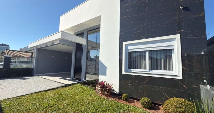 Casa de alto padrão com 3 dormitórios no centro de Tramandaí