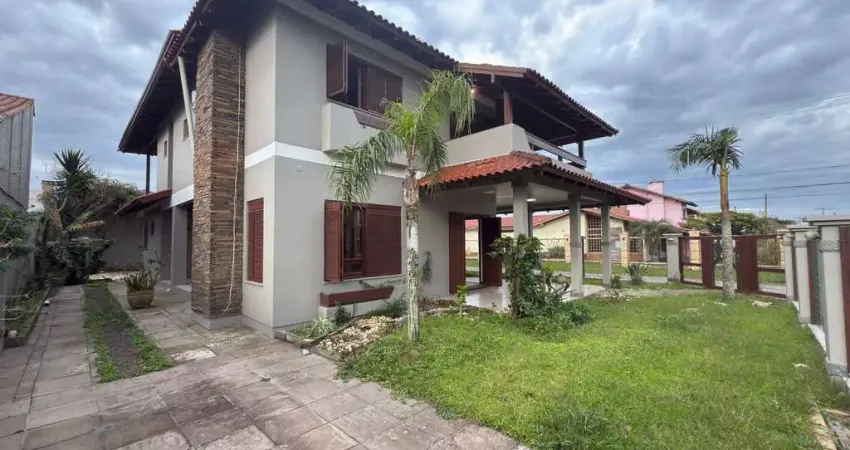Sobrado com piscina dispondo de 5 dormitórios a venda na Zona Nova de Tramandaí