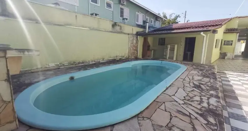 Casa com otima localizacao martin de sa com 4 dormitorios, 3 suites, edicula, piscina e 6 vagas de garagem