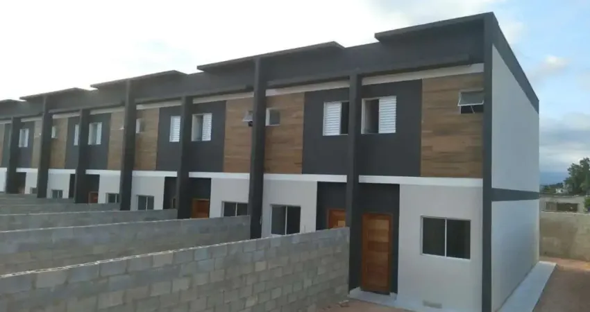 Sobrado em condominio a venda, 70m2, 02 suites, taruma, caraguatatuba sp.