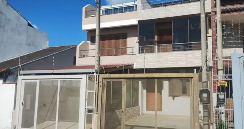 Casa com 3 quartos à venda na Rua Waldemar da Silva Tavares, 234, Guarujá, Porto Alegre