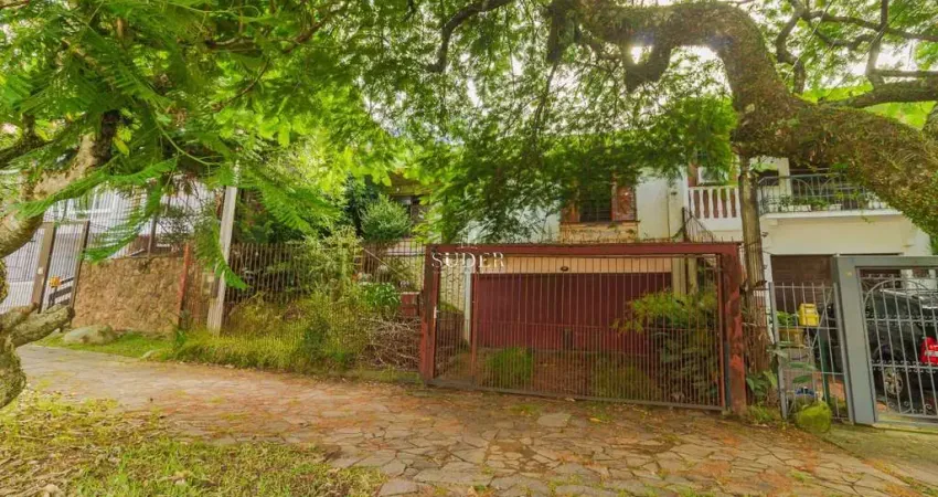 Casa com 4 quartos à venda na Avenida General Barreto Viana, 537, Chácara das Pedras, Porto Alegre