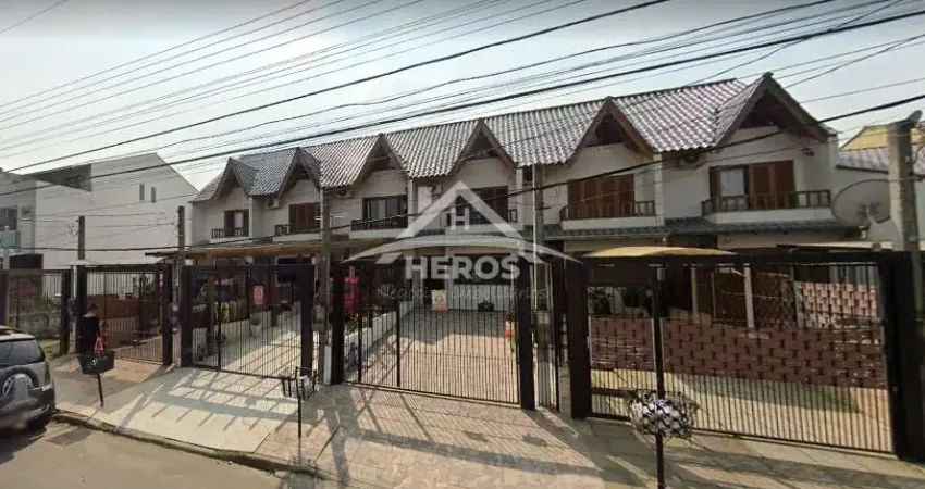 Casa com 3 quartos à venda na Rua Heitor Kramer, 254, Guarujá, Porto Alegre