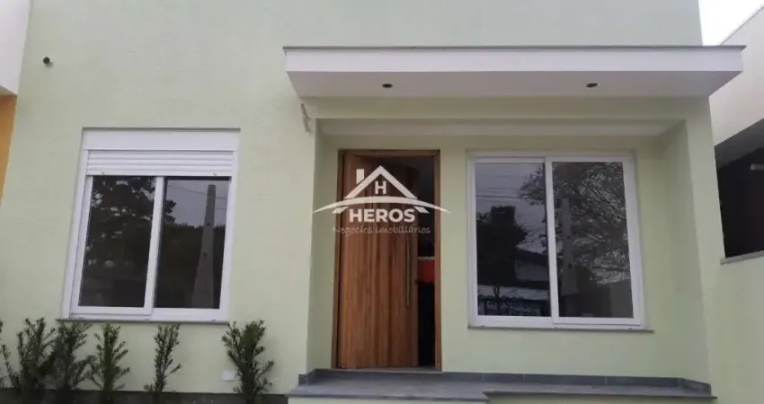 Casa com 3 quartos à venda na Rua Criciúma, 35, Guarujá, Porto Alegre