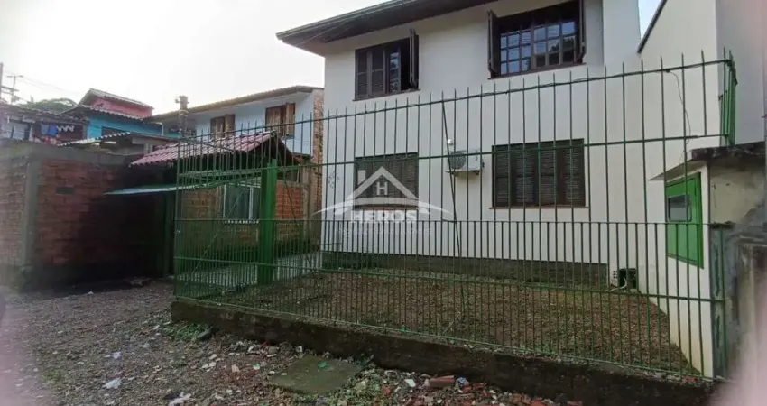 Casa com 6 quartos à venda na Rua Atílio Supertti, 2327, Vila Nova, Porto Alegre
