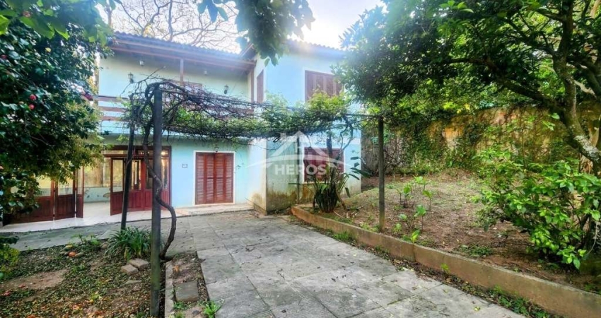 Casa com 4 quartos à venda na Rua Monte Claro, 74, Hípica, Porto Alegre
