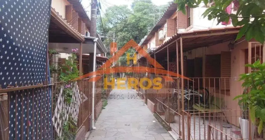 Casa em condomínio fechado com 2 quartos à venda na Rua Mura, 371, Guarujá, Porto Alegre