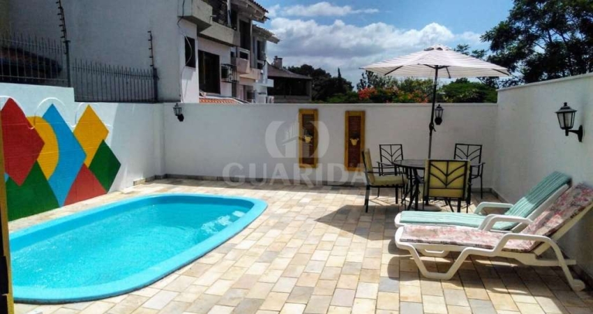 Casa com 4 quartos à venda na Rua Professor Antônio José Remião, 62, Espírito Santo, Porto Alegre