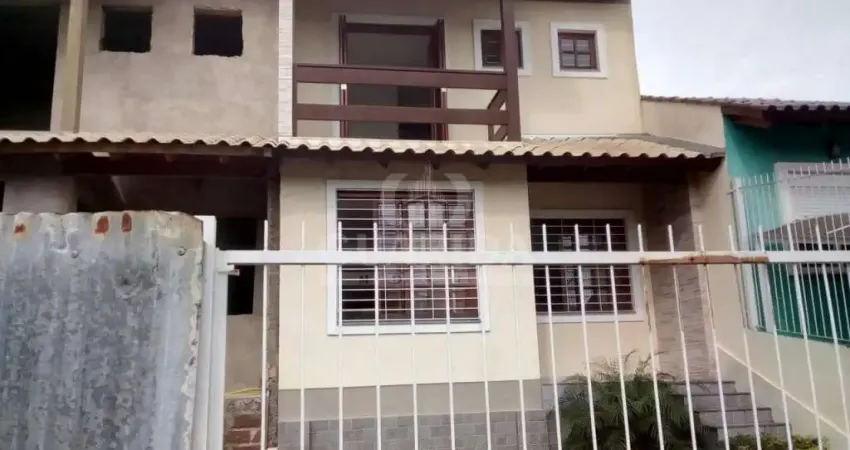 Casa com 3 quartos à venda na Rua Itacyr Rossi, 10, Guarujá, Porto Alegre