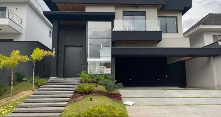 Casa à venda, belíssima arquitetura, 4 suítes, no Condomínio Jaguary!
