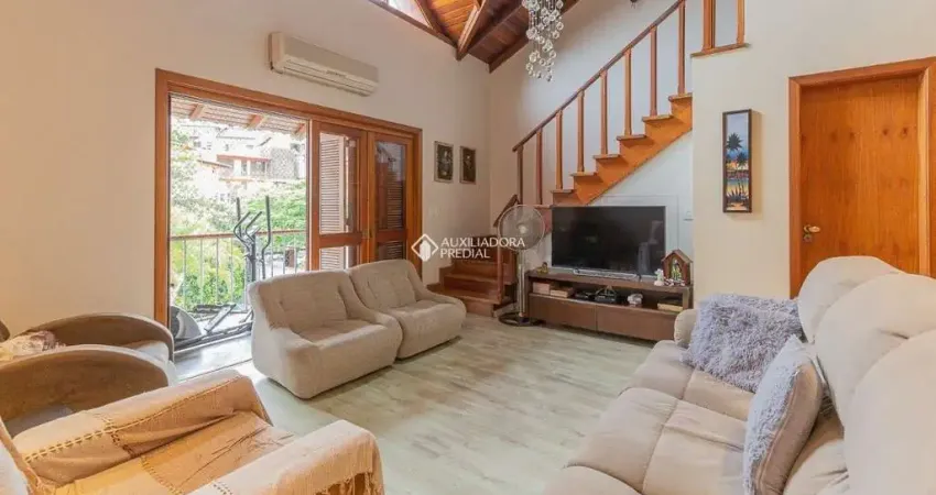 Casa em condomínio fechado com 4 quartos para alugar na Avenida José Gertum, 369, Chácara das Pedras, Porto Alegre