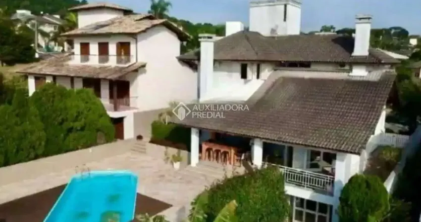 Casa em condomínio fechado com 3 quartos à venda na Rodovia Haroldo Soares Glavan, 3820, Cacupé, Florianópolis