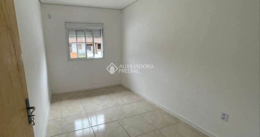 Casa com 2 quartos à venda na Beco Barbosa Neto, 805, Neópolis, Gravataí