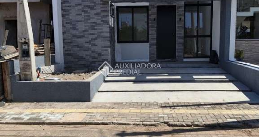 Casa em condomínio fechado com 3 quartos à venda na Rua das Camélias, 329, Parque da Matriz, Gravataí