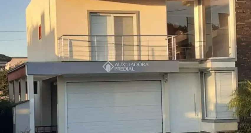 Casa com 4 quartos à venda na Rua Antônio Baggio, 40, Loteamento Jardim Timbaúva, Gravataí