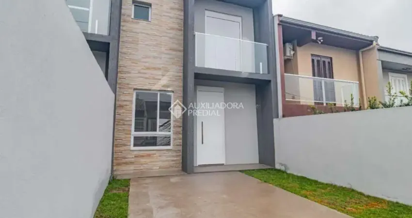 Casa com 3 quartos à venda na Rua Getúlio Celso Nunes, 97, Loteamento Jardim Timbaúva, Gravataí