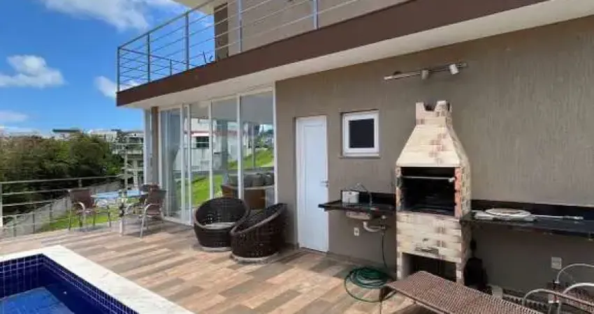 Casa em condomínio fechado com 4 quartos para alugar na Rua Caraíva, 7677, Alphaville (Abrantes), Camaçari