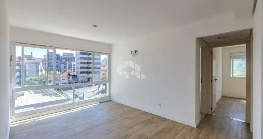 Apartamento com dois quartos e duas vagas, no Rio Branco