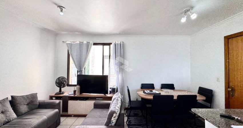 Apartamento um quarto, com lareira, churrasqueira e uma vaga