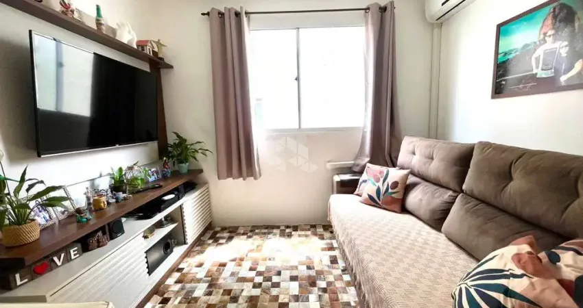 Apartamento 2 quartos, living para dois ambientes, box coberto no Bairro Mário Quintana