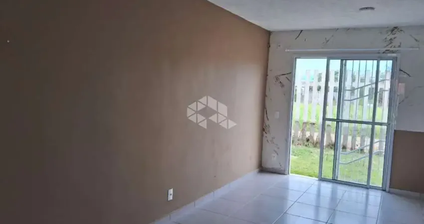 ICasa a venda com 02 dormitorios, sala cozinha conjulgados, banheiro, pátio , vaga de garagem, em frente a casa em condomínio fechado
