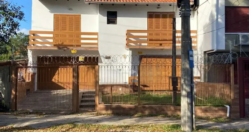 Casa com 3 quartos à venda na Rua Bogotá, 515, Jardim Lindóia, Porto Alegre