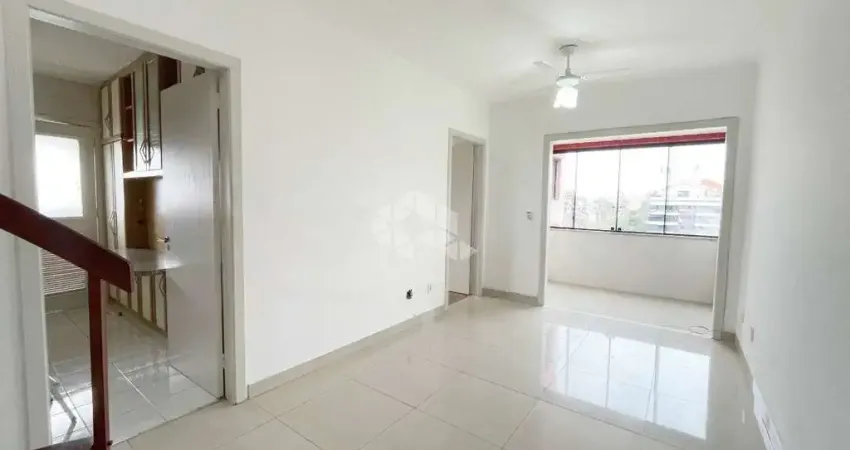 Cobertura de 3 dormitórios, 1 suíte e 2 vagas no bairro Jardim Lindóia em Porto Alegre-RS!