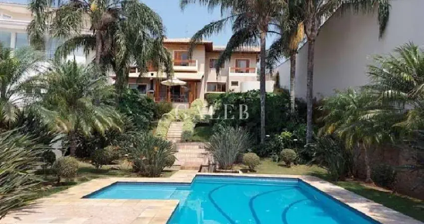 Casa alto padrão em condomínio dentro da cidade com 4 dormitórios piscina lago 2 áreas gourmets