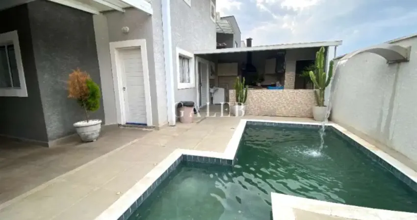 2 suítes, 4 banheiros, 2 vagas cobertas, piscina, churrasqueira, bairro planejado