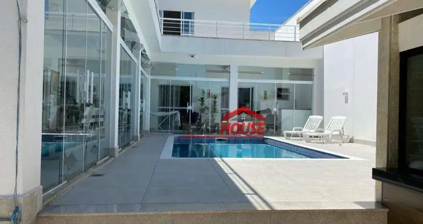 Casa com 4 dormitórios à venda, 393 m² por R$ 1.700.000 - Centro - Caraguatatuba/SP