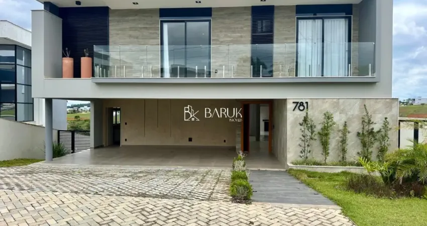 Casa 4 suítes com 420 m2 de área construída no condomínio Alphaville