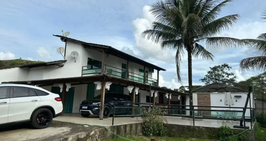 Casa com 3 suítes, área gourmet e toda mobiliada, com sistema de segurança