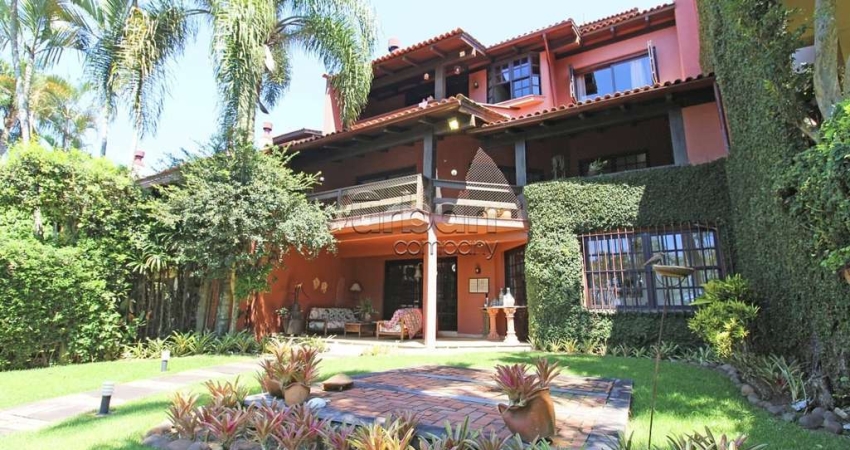 Casa em condomínio fechado com 4 quartos à venda na Dra. Aurora Nunes Wagner, 90, Santa Tereza, Porto Alegre