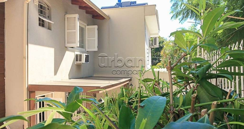 Casa em condomínio fechado com 3 quartos à venda na Rua Artur Rocha, 605, Auxiliadora, Porto Alegre