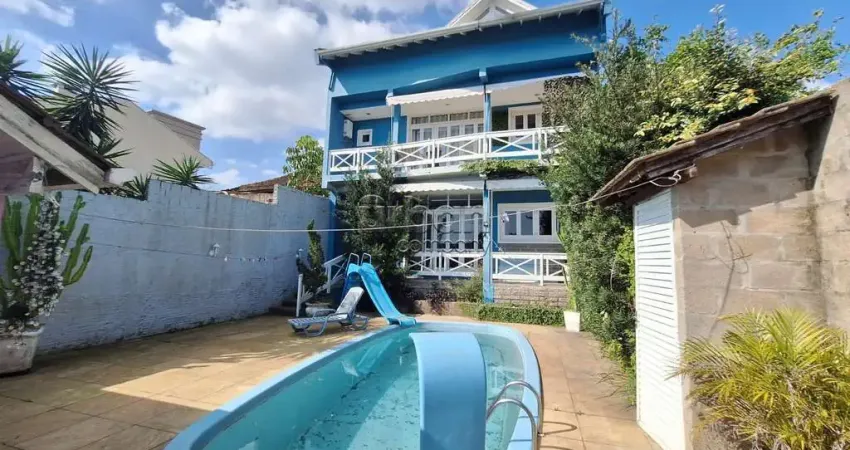 Casa em condomínio fechado com 3 quartos à venda na Rua Itapema, 156, Vila Jardim, Porto Alegre